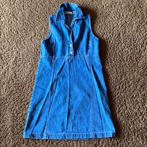Super cute jean dress.